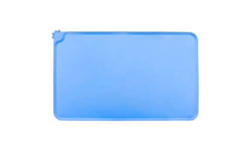 Waterproof silicone cat feeding mat in blue with raised edges to stop spills from reaching and damaging your floor.